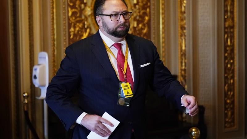 Jason Miller, Senior Adviser to the Trump 2020 re-election campaign, walks in on the first day of former President Donald Trump's second impeachment trial at the U.S. Capitol on February 9, 2021 in Washington, DC.