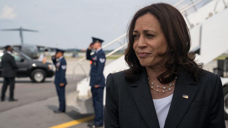 Harris talking to the press