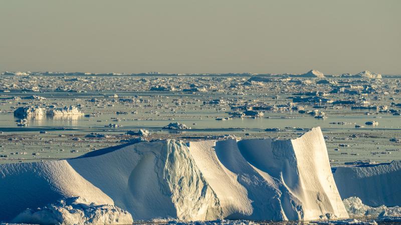 Icebergs near Ilulissat, Greenland. Climate change is having a profound effect in Greenland with glaciers and the Greenland ice cap retreating.