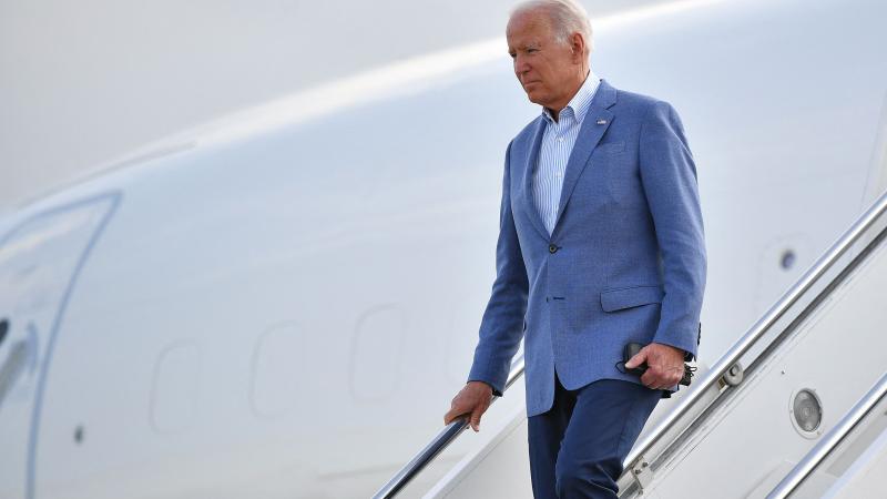 US President Joe Biden steps off Air Force One upon arrival at New Castle Airport in New Castle, Delaware on July 3, 2021.