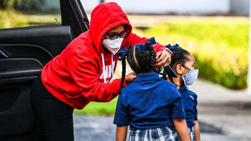 Schoolchildren wearing masks