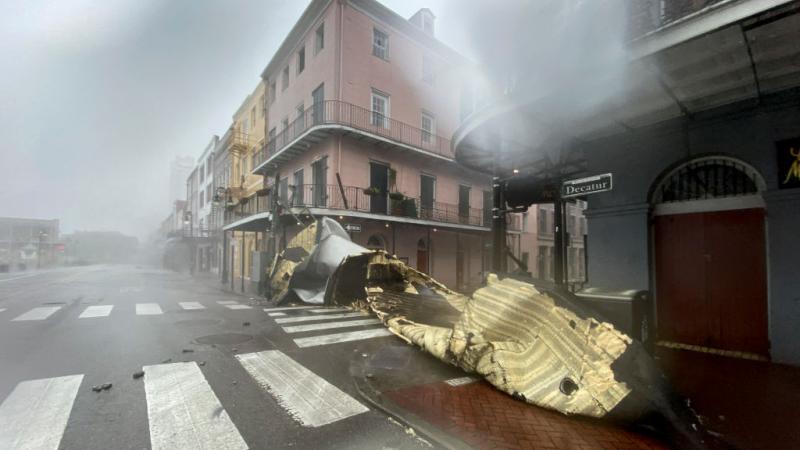 A section of a building's roof is seen after being blown off during rain and winds in the French Quarter of New Orleans, Louisiana on August 29, 2021 during Hurricane Ida