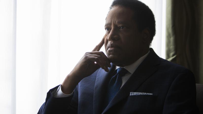 Larry Elder sits in his hotel room in San Francisco, Calif., on Wednesday, July 14, 2021.