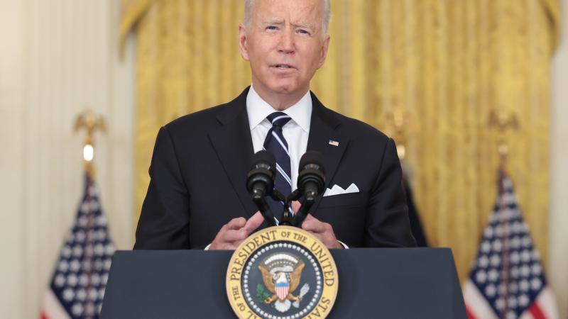 U.S. President Joe Biden gestures as he delivers remarks on the COVID-19 response and the vaccination program in the East Room of the White House on August 18, 2021 in Washington, DC.