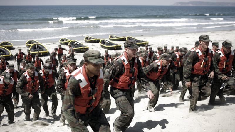 A group of Navy Seal trainees in August of 2010 during Hell Week at a beach in Coronado, California.