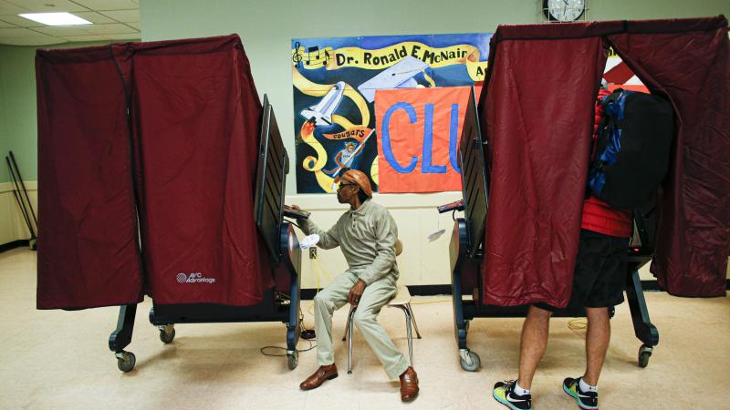 A man cast his vote at a polling booth on November 5, 2019 in Jersey City, New Jersey.