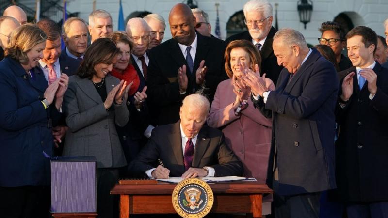 Biden signs $1 trillion infrastructure bill 