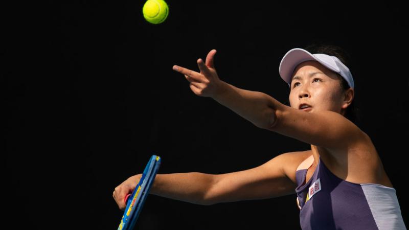 Peng Shuai of China serves to Hibino Nao of Japan during their women's singles first round match at the Australian Open tennis championship in Melbourne, Australia on Jan. 21, 2020. (Photo by Bai Xue/Xinhua via Getty) (Xinhua/Bai Xue via Getty Images)