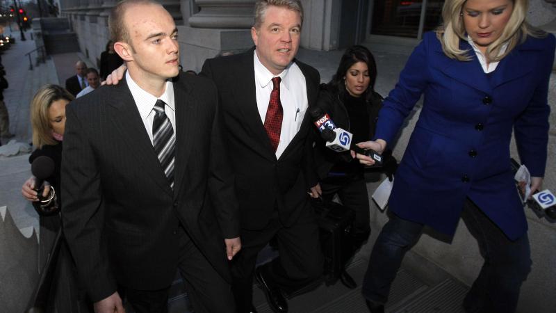 Former Army Sgt. and Blackwater security guard Nick Slatten (L) surrenders to federal authorities with attorney Thomas Connolly (C) December 8, 2008 in Salt Lake City, Utah.