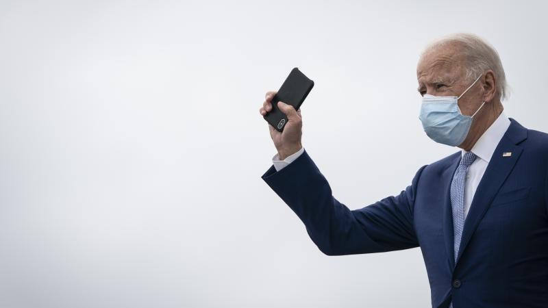 Joe Biden with cellphone, Georgia, 2020