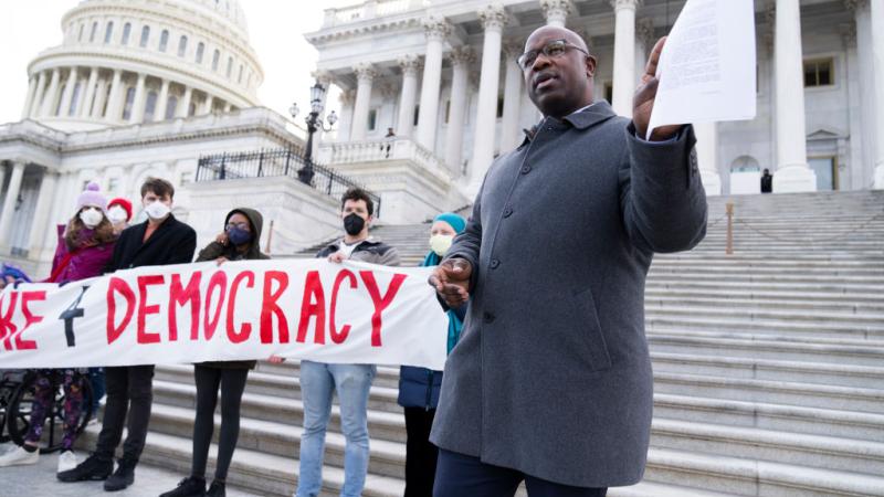 Jamaal Bowman, D-N.Y., holds a rally outside the U.S. Capitol to urge the Senate to pass voting rights legislation