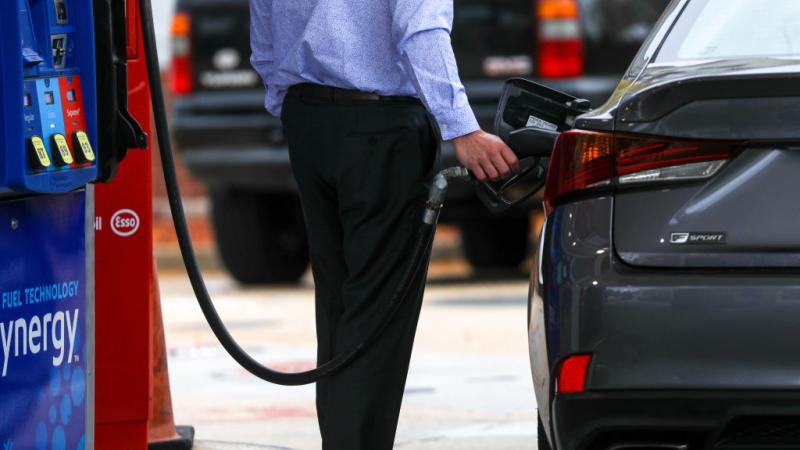 A man pumping gas, Washington, D.C.
