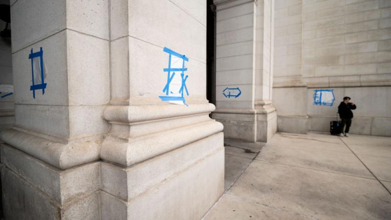 Dozens of swastikas and anti-Obama slogans, most of them covered up by workers, were drawn on pillars around the exterior of Union Station in Washington