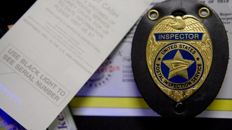 U.S. Postal Inspection Service workers investigate mail related crimes