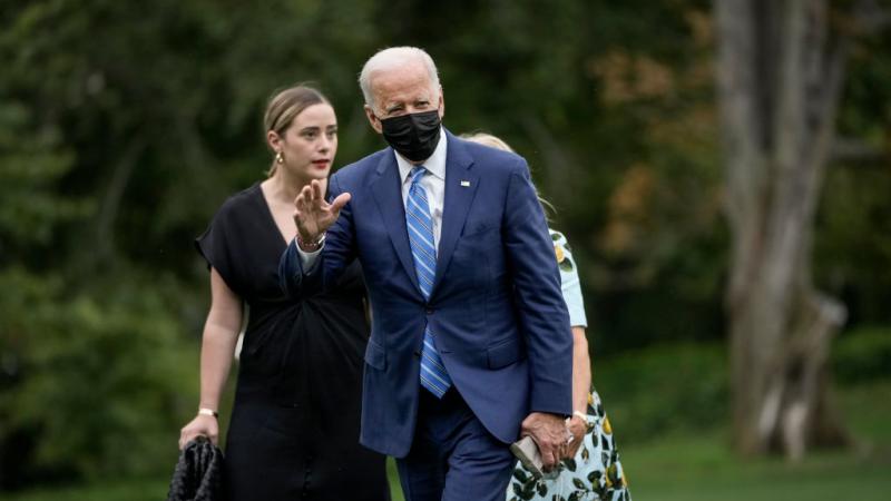 Granddaughter Naomi Biden, U.S. President Joe Biden and first lady Jill Biden exit Marine One on the South Lawn of the White House