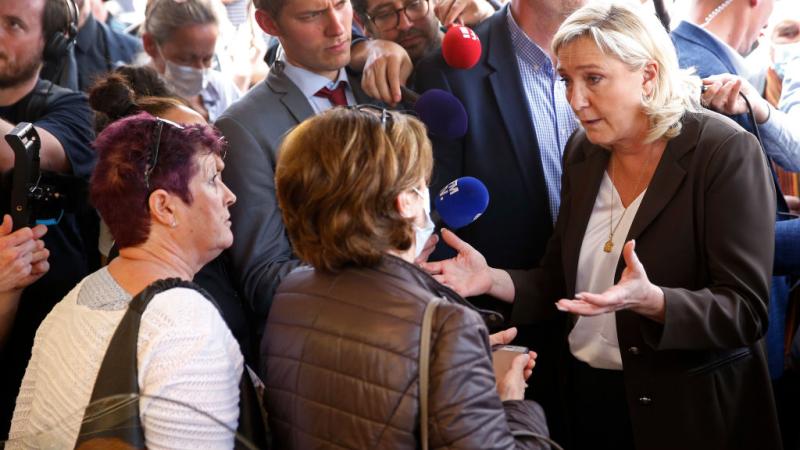 Marine Le Pen candidate for the 2022 French presidential election speaks with supporters