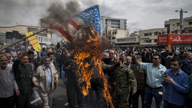 Iranians burning U.S. flag