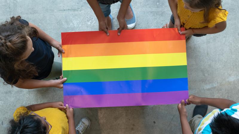 Students, gay pride flag