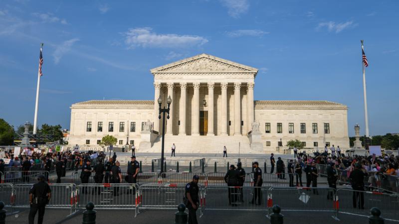 Anti-abortion and abortion rights demonstrators during a protest outside the U.S. Supreme Court in Washington, D.C., U.S., on Tuesday, May 3, 2022.