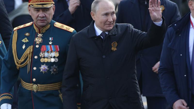 Vladimir Putin with military personnel