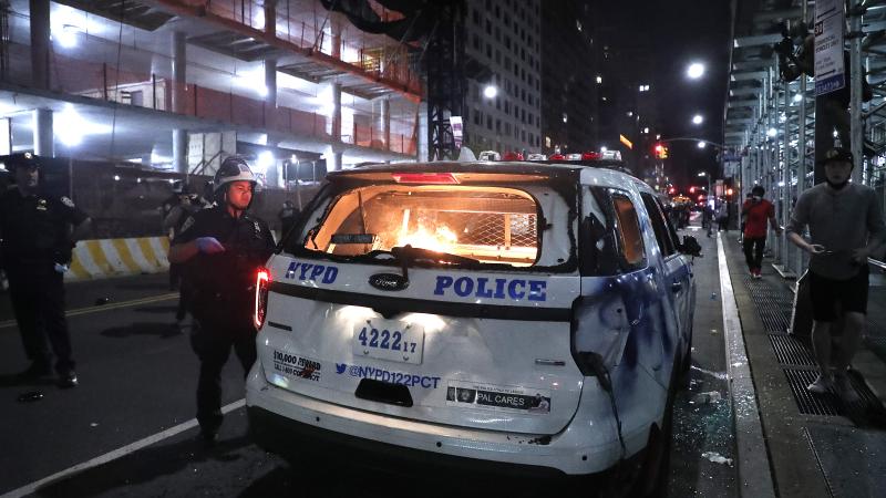 Police car is on fire during a demonstration in response to the death of a Minneapolis man George Floyd on May 29, 2020 in New York City.