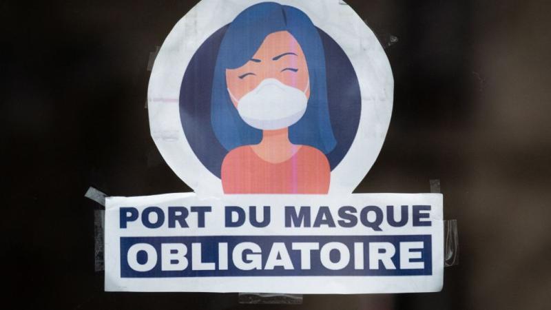A mandatory mask sign in France, March 2022