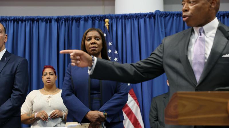 New York Attorney General Letitia James and city Mayor Eric Adams at a gun crime conference, June 29
