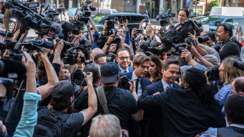 Actor Kevin Spacey (C) arrives at Westminster Magistrates Court