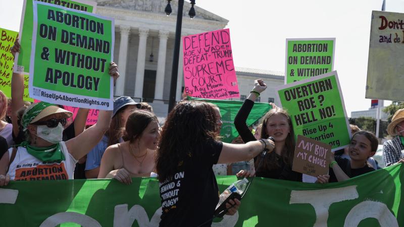 Pro-abortion rights activists demonstrate in front of the U.S. Supreme Court Building on June 13, 2022 in Washington, DC.