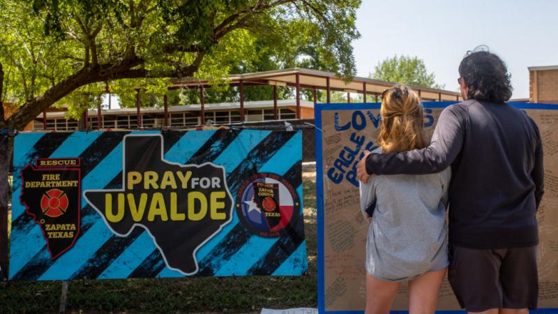 Mourners pay their respects after the Uvalde school shooting