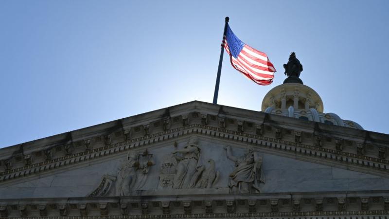 An American flag atop the U.S. Capitol, June 2022