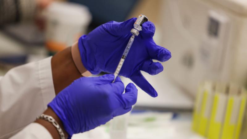 Filling a COVID vaccine