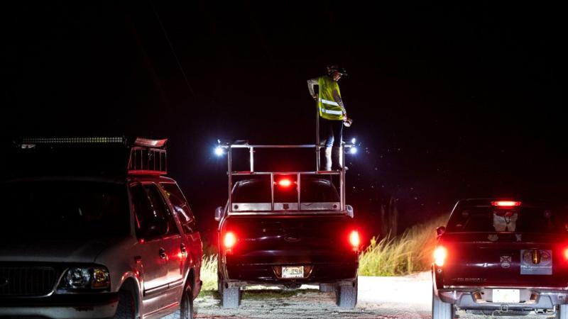 Snake hunters in Florida, Aug. 2022