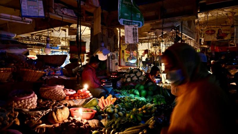 A vegetable market in Dhaka during the blackout, Oct. 4