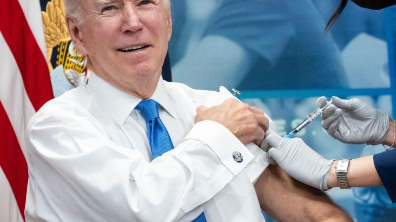 President Biden getting a COVID booster, Oct. 25