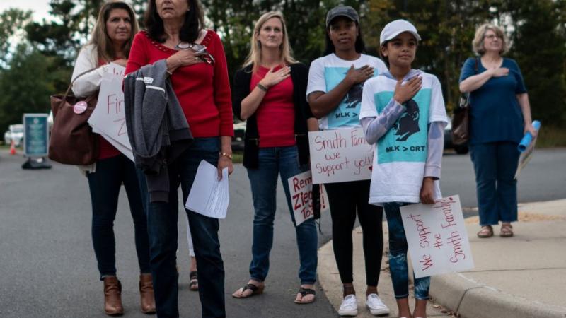 Protestors outside of a Loudon County Public Schools board meeting, Oct. 2021