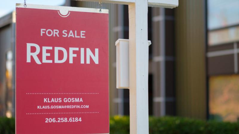 A Redfin for-sale sign