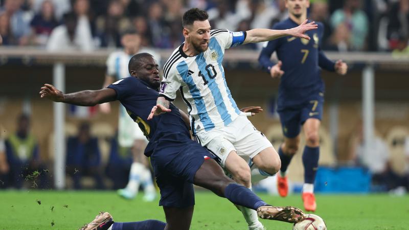 Argentina's Lionel Messi, France's Dayot Upamecano, FIFA World Cup Qatar, Dec. 18, 2022