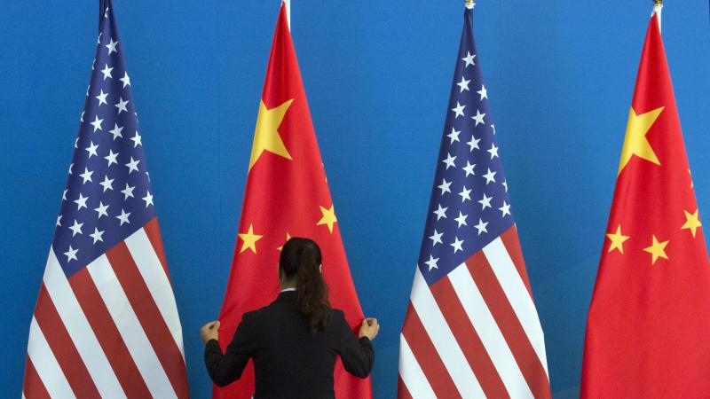 China flags side by side with USA Flag 