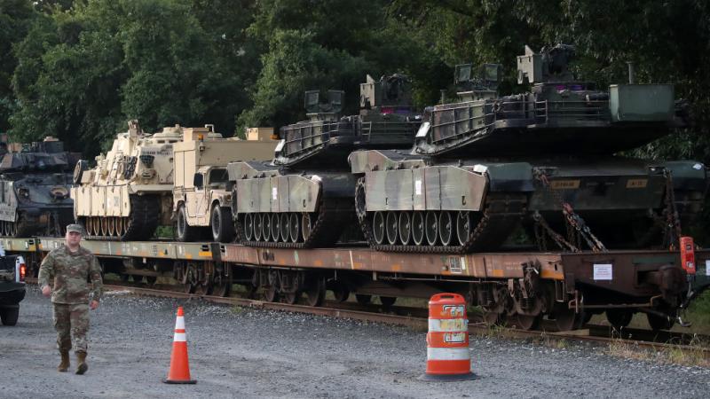 Two M1A1 Abrams tanks (rightmost)