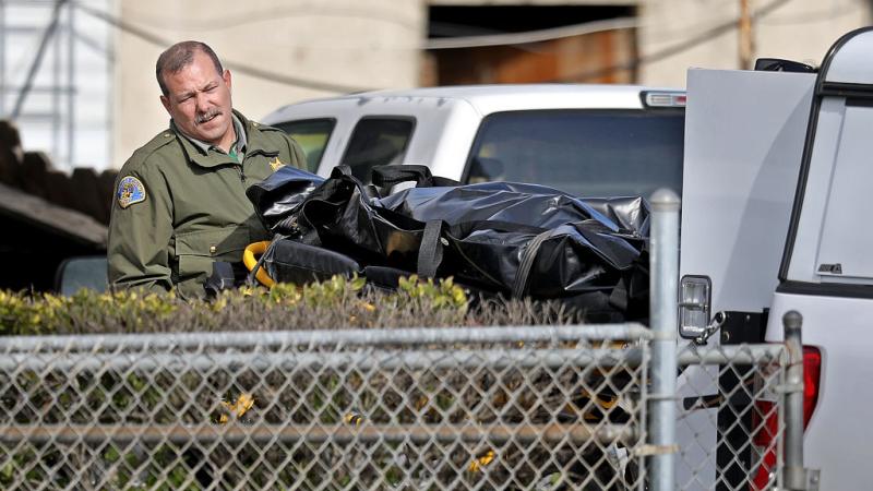 A deputy with Tulare County Sheriff's Department at the crime scene, Jan. 16
