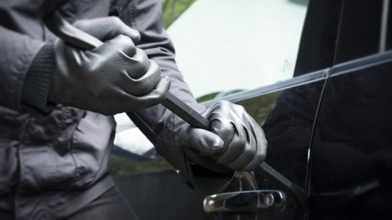 Car burglary, stock photo