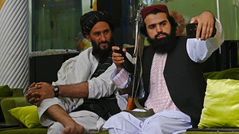 Taliban fighters take selfie, Kabul, Afghanistan, Sept. 11, 2021