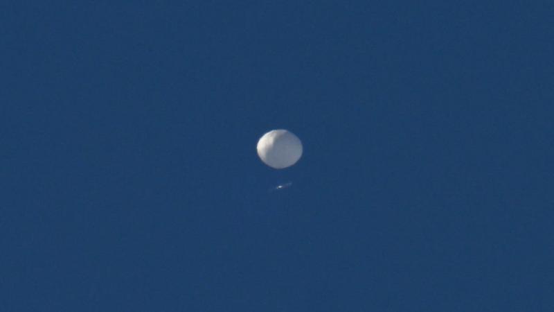 The now-destroyed Chinese spy balloon over North Carolina, Feb. 4