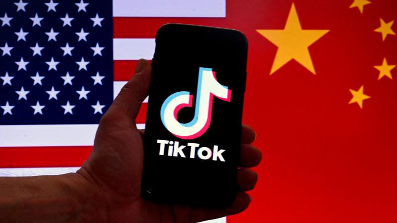U.S. flag, China flag, TikTok, Washington, D.C., March 16, 2023