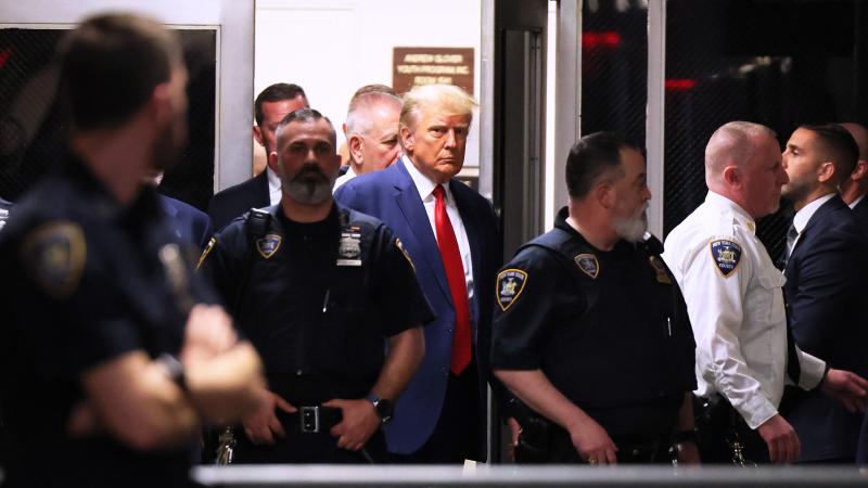 Former U.S. President Donald Trump arrives for his arraignment at Manhattan Criminal Court on April 04, 2023 in New York City.