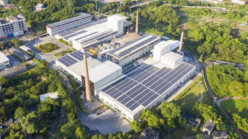 The roof of the factory is covered with solar photovoltaic panels 