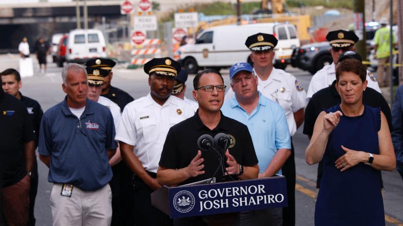 Pennsylvania Governor Josh Shapiro speaking to the media near the site of the highway collapse