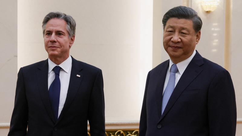 Antony Blinken (Left) with Xi Jinping (Right)