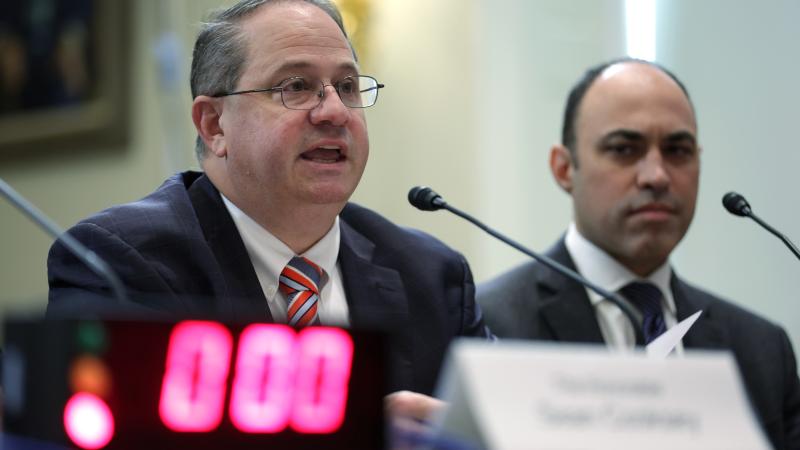 Federal Election Commission Commissioner James E. "Trey" Trainor III (L) and Commissioner Allen Dickerson (R) testify during a hearing before House Administration Committee